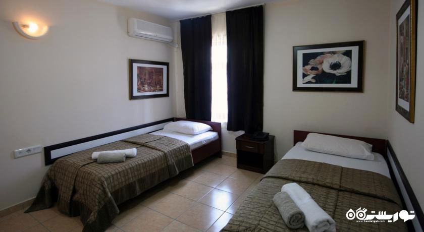 نمای تخت های اتاق توئین